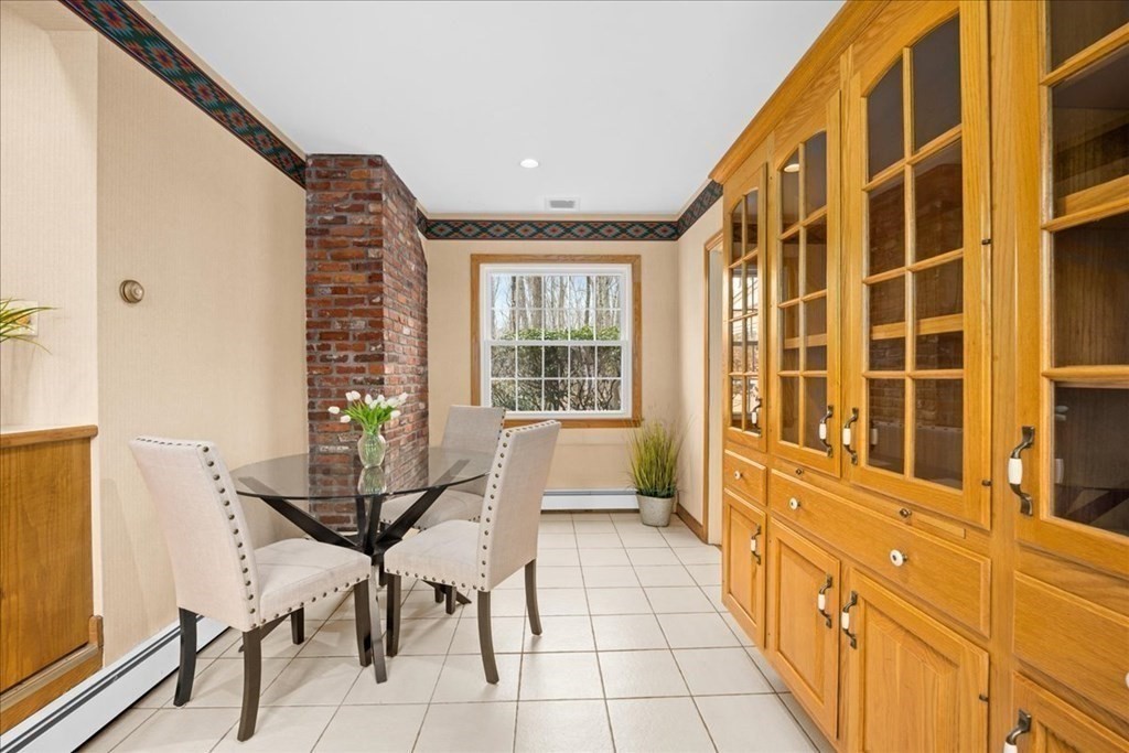 24 Oregon Road Ashland, MA 01721 - Photo 8 of 42 a dining room with furniture and window