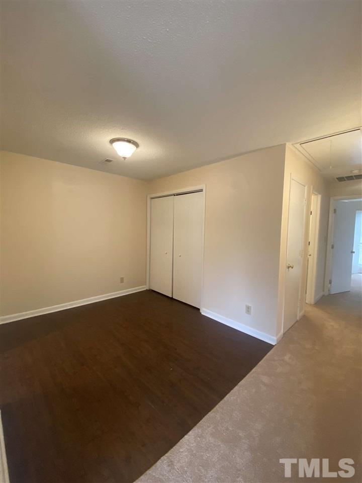 5820 Pointer Drive, Unit 202 Raleigh, NC 27609 - Photo 12 of 20 a view of an empty room
