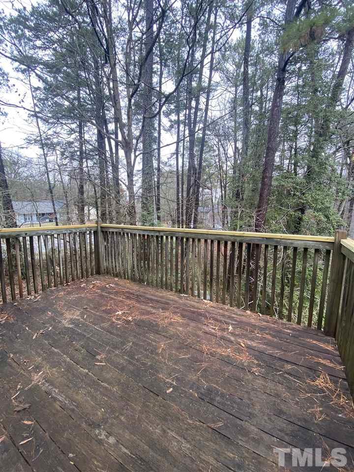 5820 Pointer Drive, Unit 202 Raleigh, NC 27609 - Photo 18 of 20 a view of backyard with trees