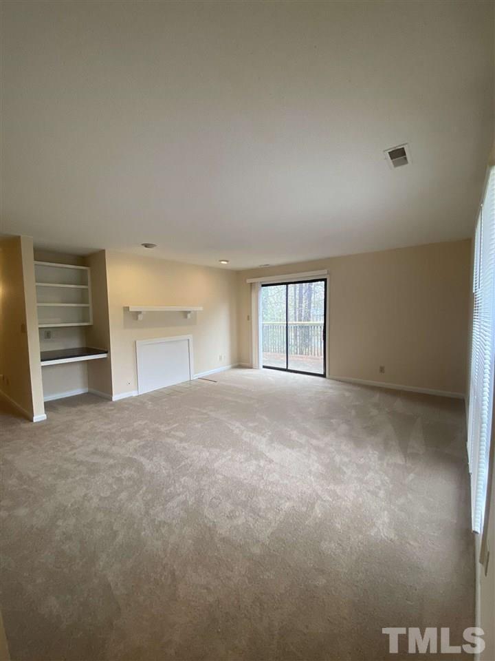 5820 Pointer Drive, Unit 202 Raleigh, NC 27609 - Photo 6 of 20 a view of empty room