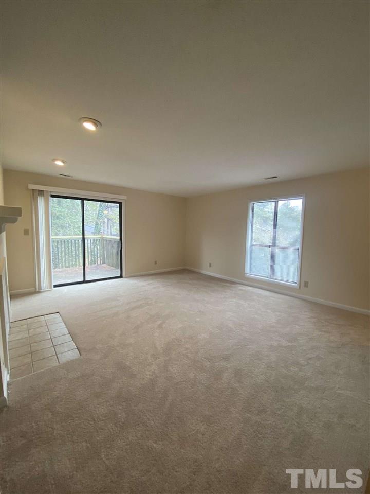 5820 Pointer Drive, Unit 202 Raleigh, NC 27609 - Photo 7 of 20 a view of an empty room with a window
