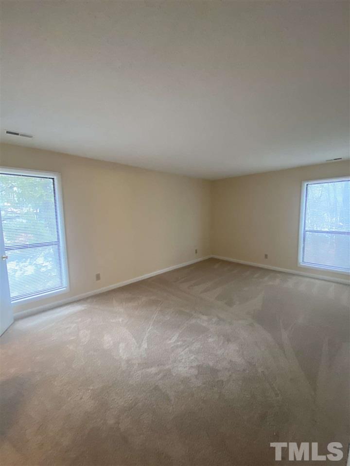 5820 Pointer Drive, Unit 202 Raleigh, NC 27609 - Photo 8 of 20 an empty room with a window
