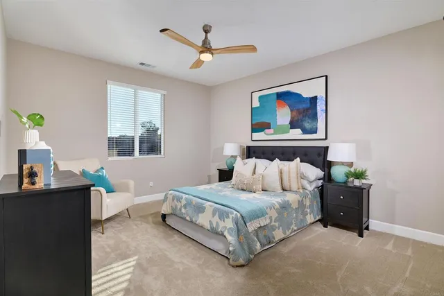 a living room with furniture and windows