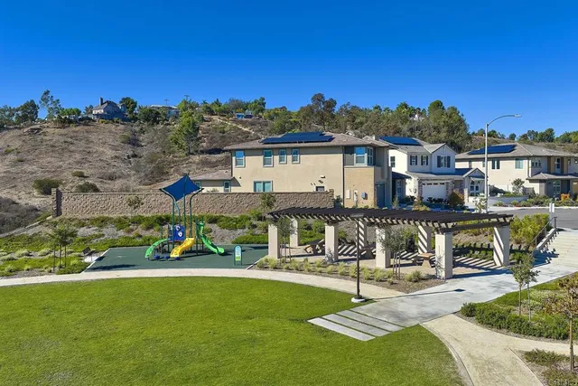 a view of a house with a yard balcony