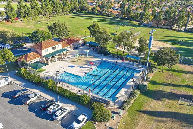 an aerial view of a house with a ocean view