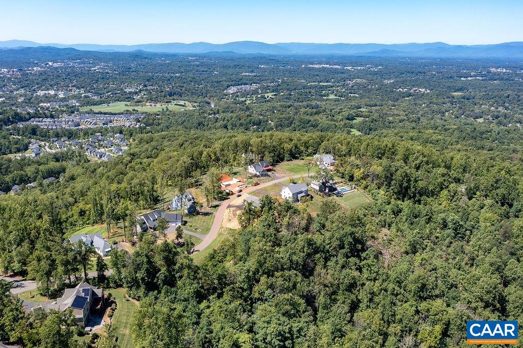 2399 Summit Ridge Trail Charlottesville, VA 22911 - Photo 46 of 54 an aerial view of residential house with parking and trees