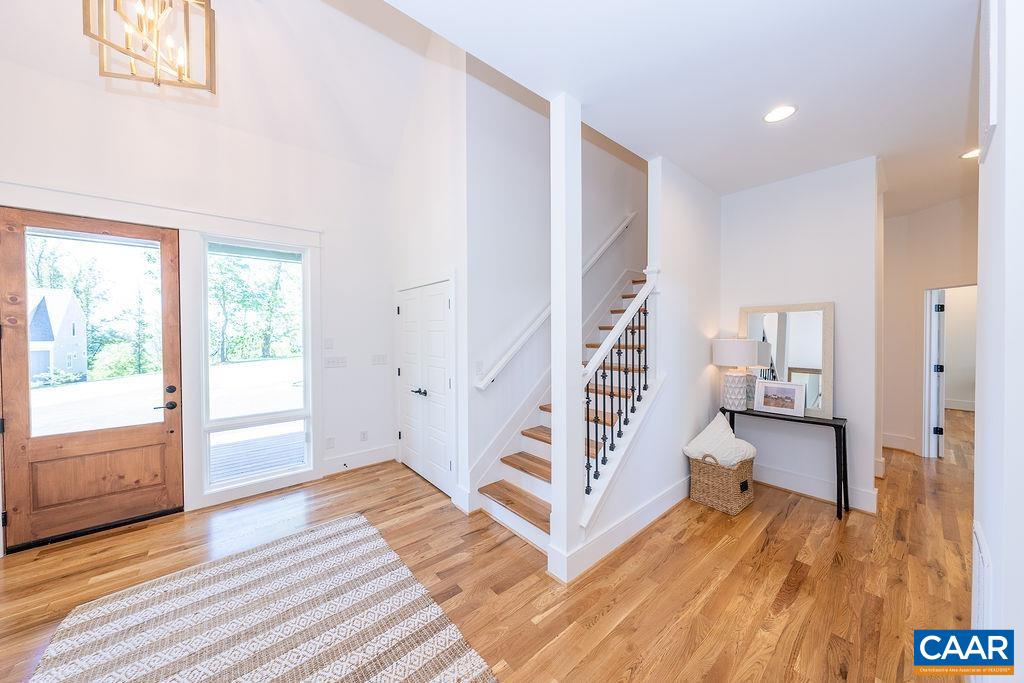 2399 Summit Ridge Trail Charlottesville, VA 22911 - Photo 5 of 54 a view of entryway with wooden floor and stairs
