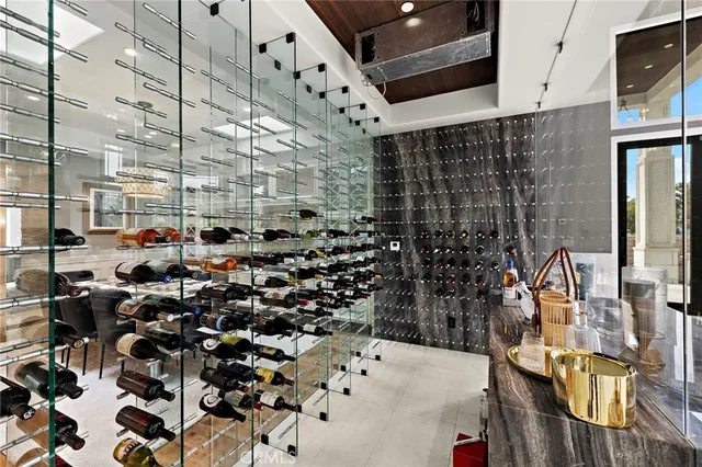 a bed room with a bed a couch and a window