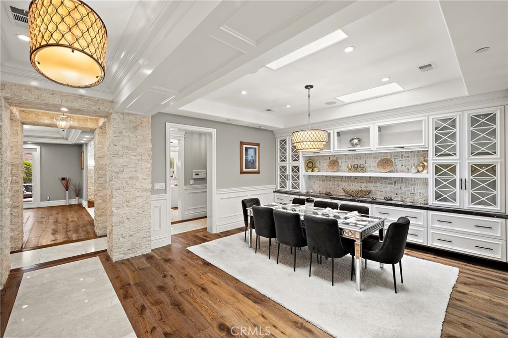 3202 Portico Del Norte San Clemente, CA 92673 - Photo 14 of 62 a dining room with wooden floor and stainless steel appliances