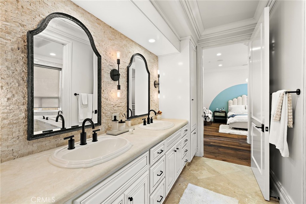 3202 Portico Del Norte San Clemente, CA 92673 - Photo 21 of 62 a spacious bathroom with a double vanity sink and a mirror