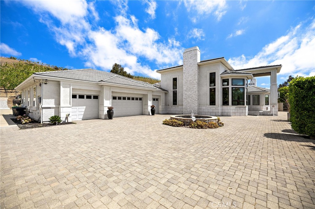 3202 Portico Del Norte San Clemente, CA 92673 - Photo 3 of 62 a view of a house with snow on the road