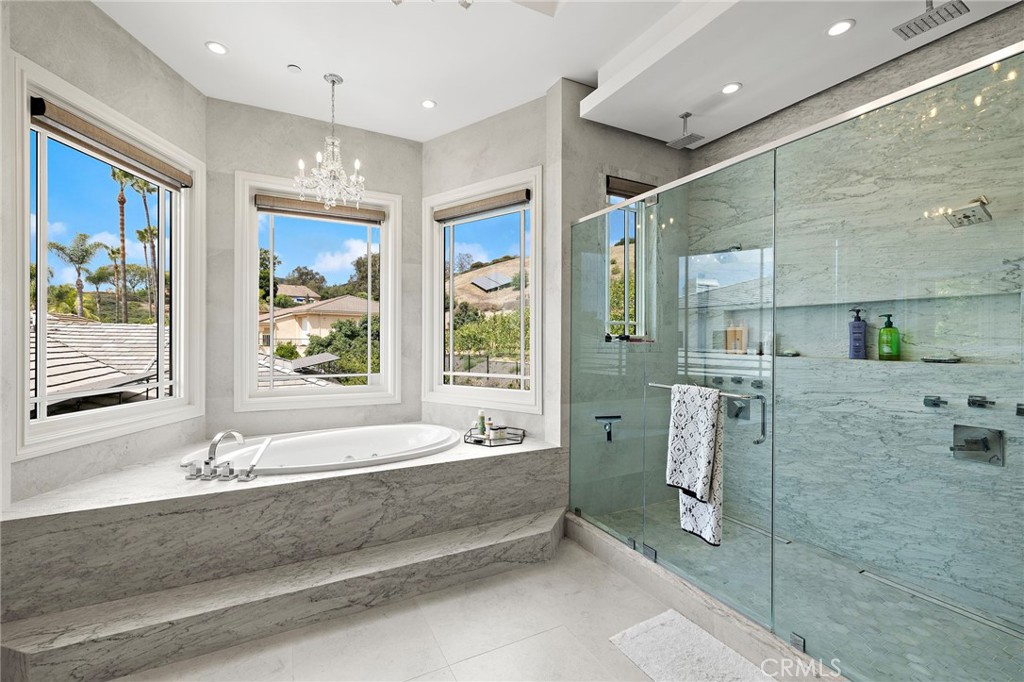 3202 Portico Del Norte San Clemente, CA 92673 - Photo 34 of 62 a bathroom with a bathtub and a shower