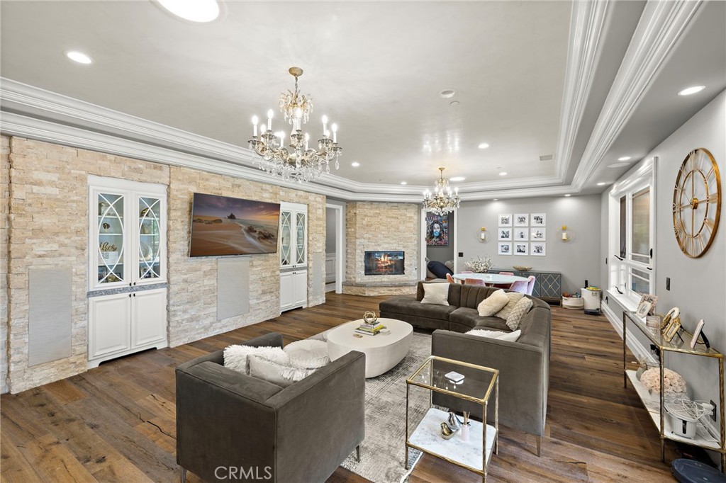 3202 Portico Del Norte San Clemente, CA 92673 - Photo 39 of 62 a living room with furniture and a chandelier