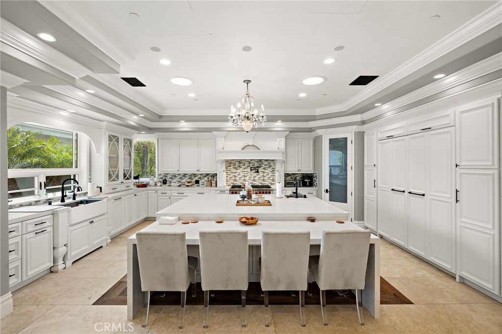 3202 Portico Del Norte San Clemente, CA 92673 - Photo 40 of 62 a large kitchen with a table and chairs