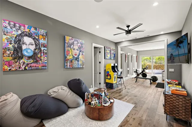 a front view of a house with swimming pool having outdoor seating