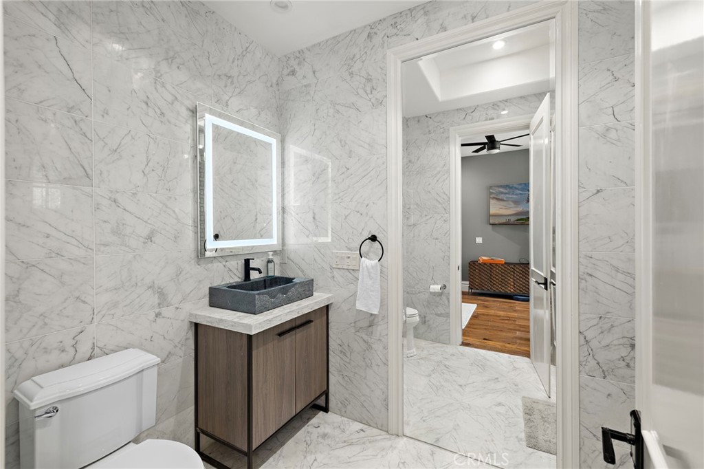 3202 Portico Del Norte San Clemente, CA 92673 - Photo 45 of 62 a bathroom with a sink toilet and shower