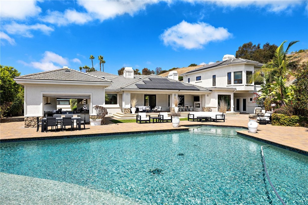 3202 Portico Del Norte San Clemente, CA 92673 - Photo 53 of 62 a front view of a house with swimming pool having outdoor seating