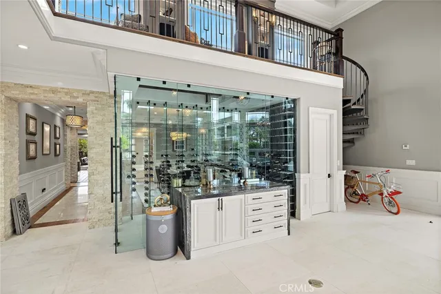 a bathroom with sink shower and a mirror