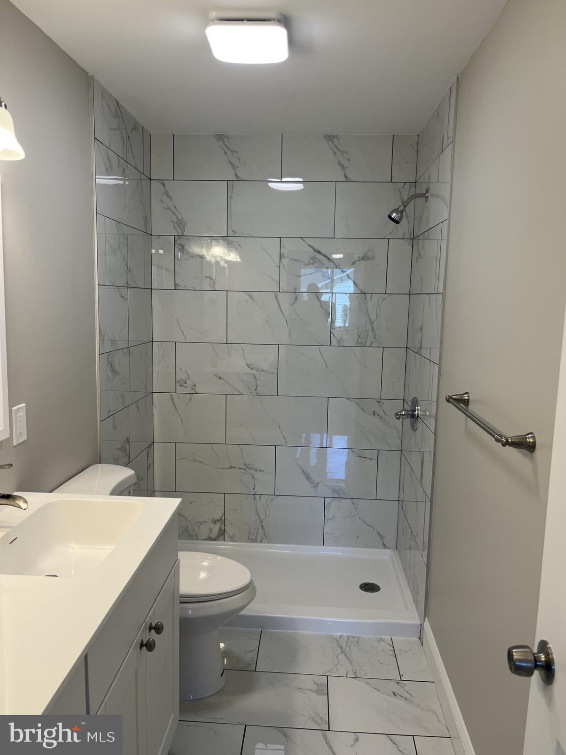 0 Will Be 11037 Bottom Road Worton, MD 21678 - Photo 14 of 32 a bathroom with a shower a toilet and sink