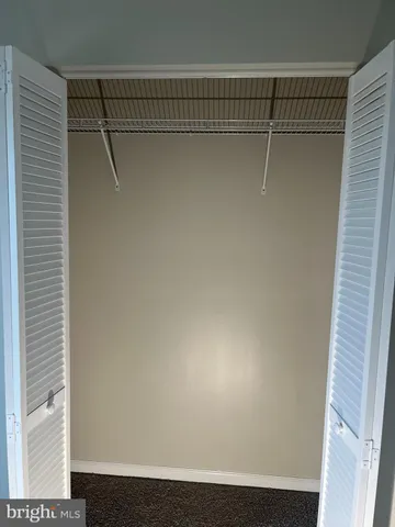 a view of bathroom with a large window