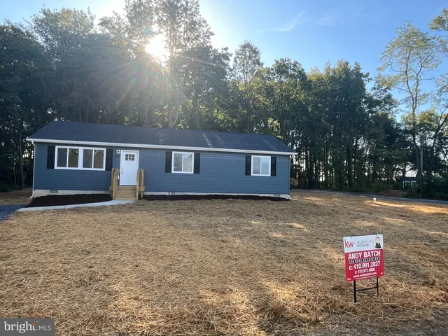 a view of a house with a swimming pool