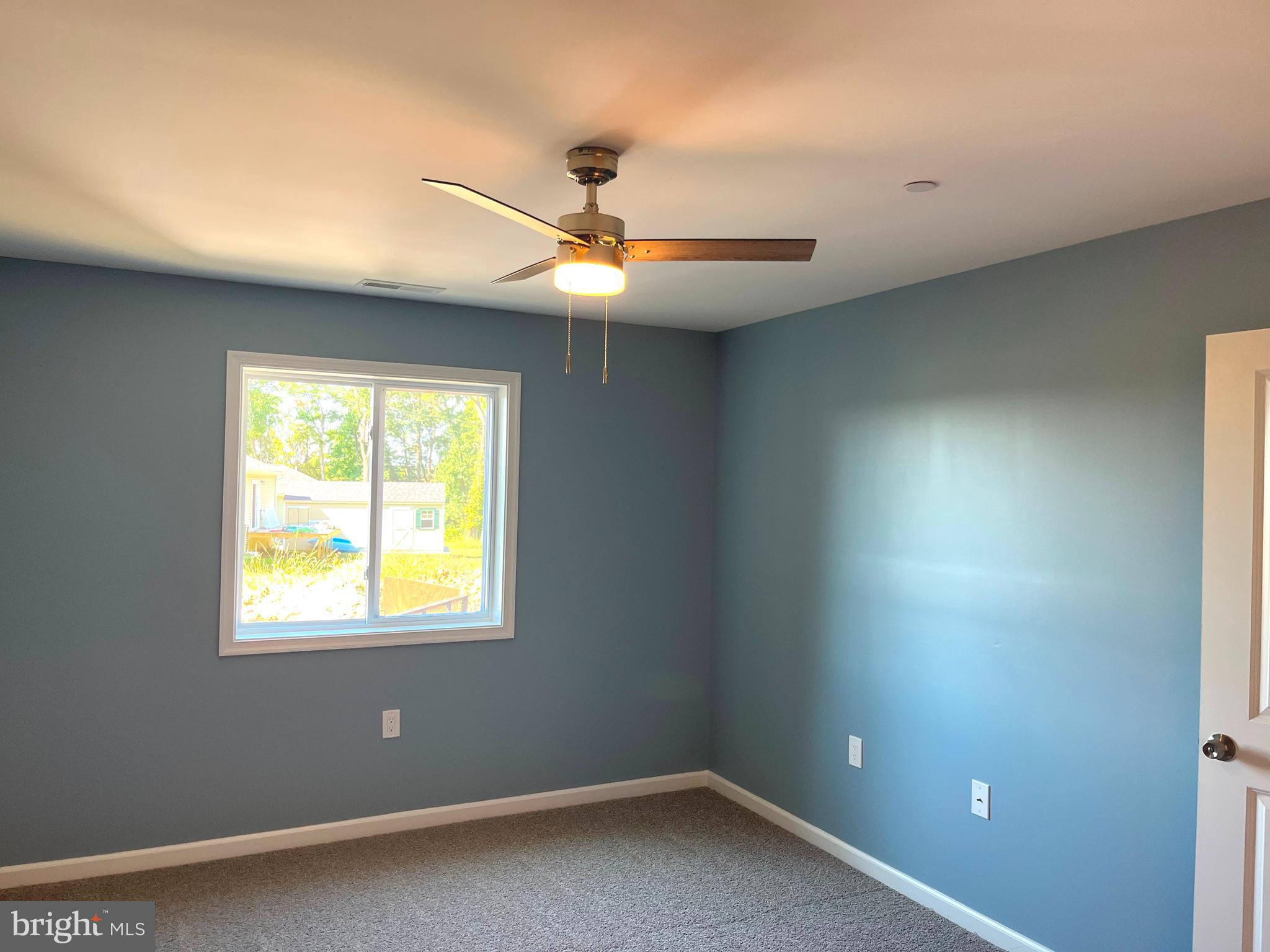 0 Will Be 11037 Bottom Road Worton, MD 21678 - Photo 10 of 32 a view of an empty room with a window
