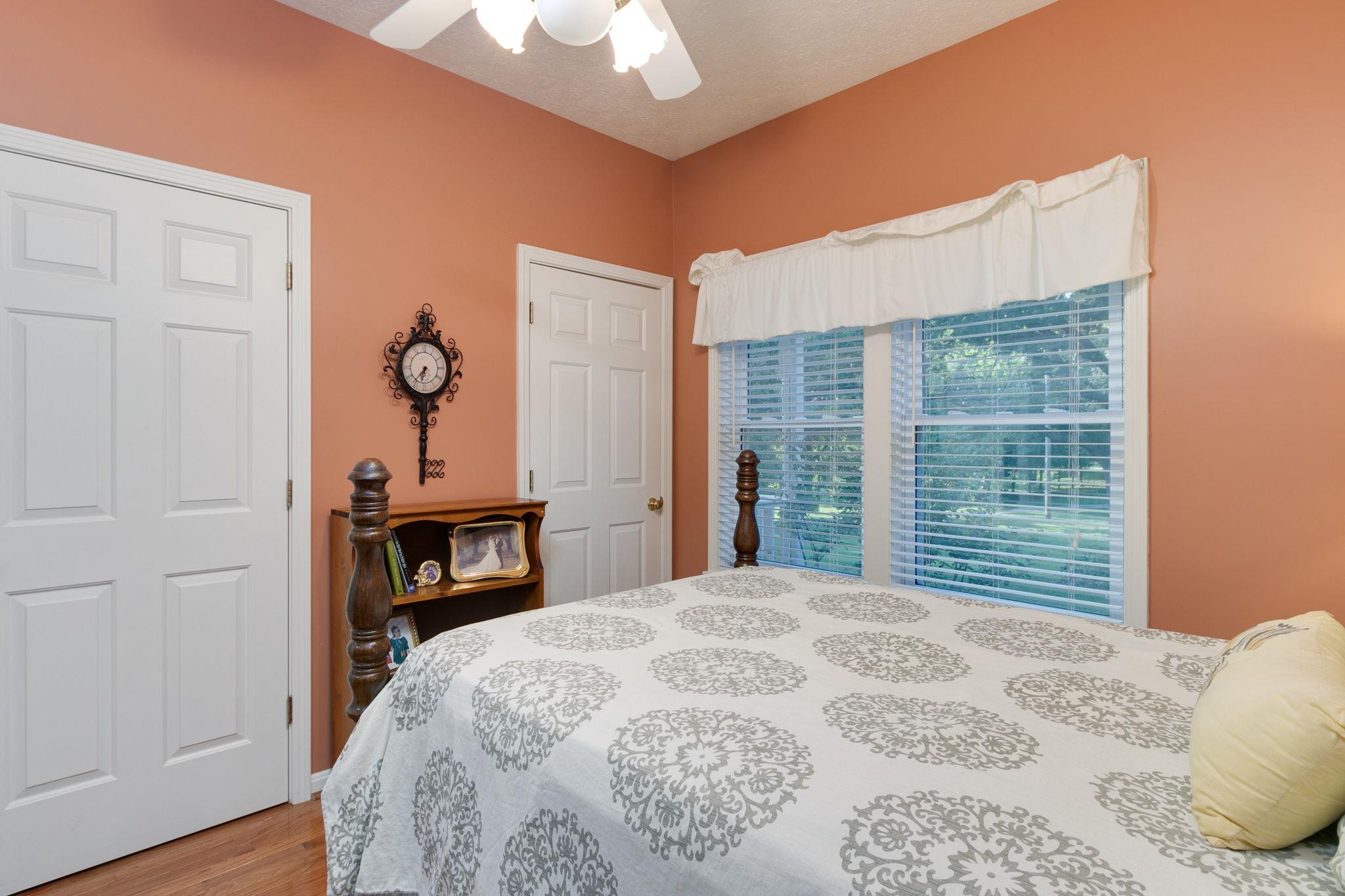 5006 Mt Zion Road Springfield, TN 37172 - Photo 22 of 29 a bedroom with a bed and a television