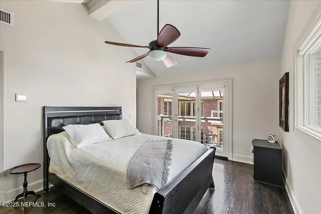 a aerial view of a house with a yard