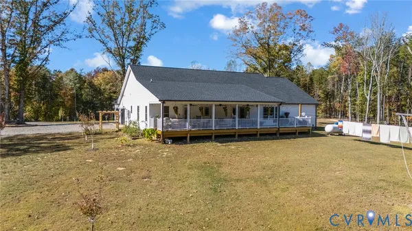 a house with trees in the background