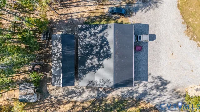 a view of a house with a tree