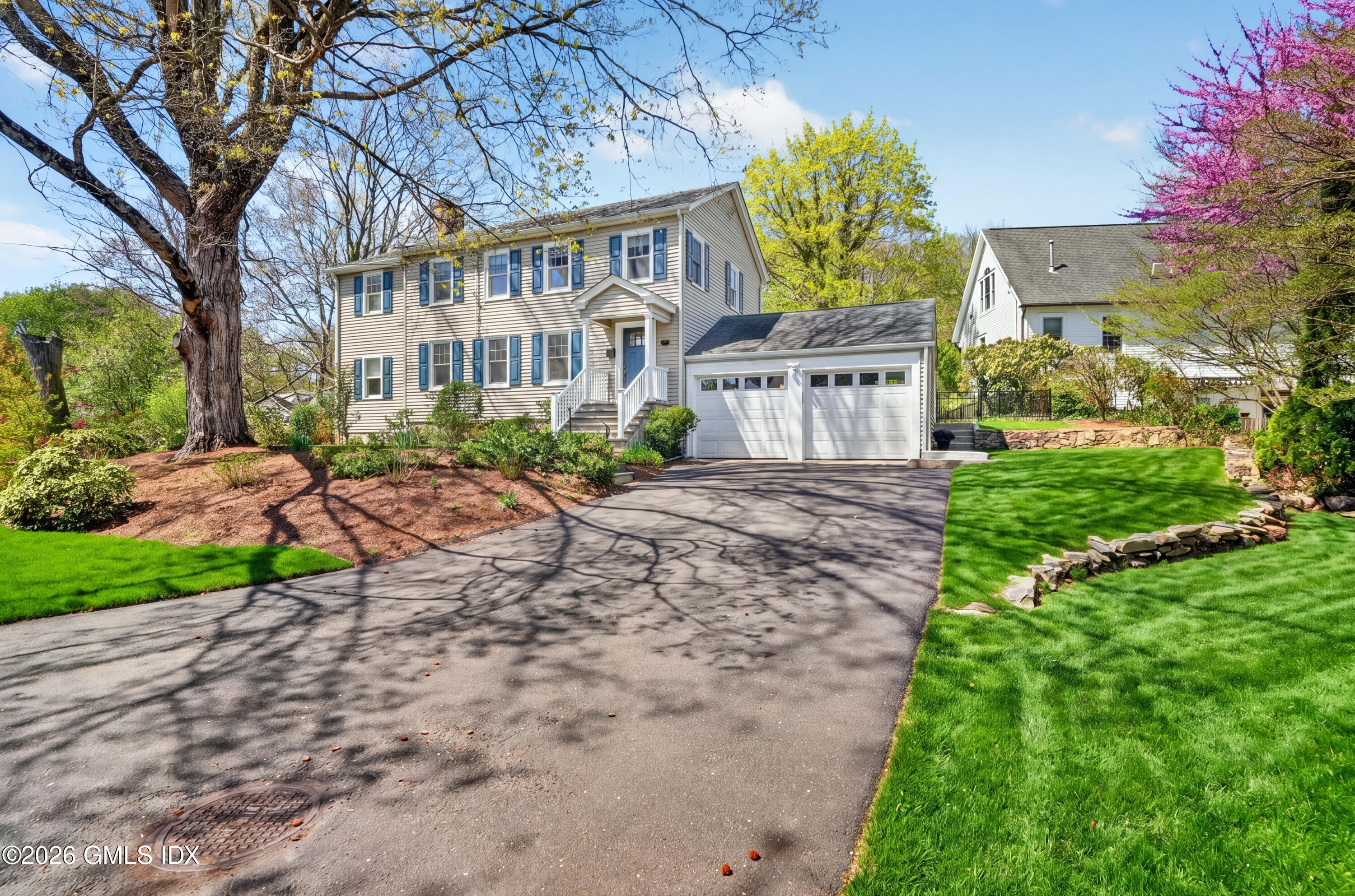 20 Ridge Road Cos Cob, CT 06807 - Photo 2 of 36 a view of a house with a yard