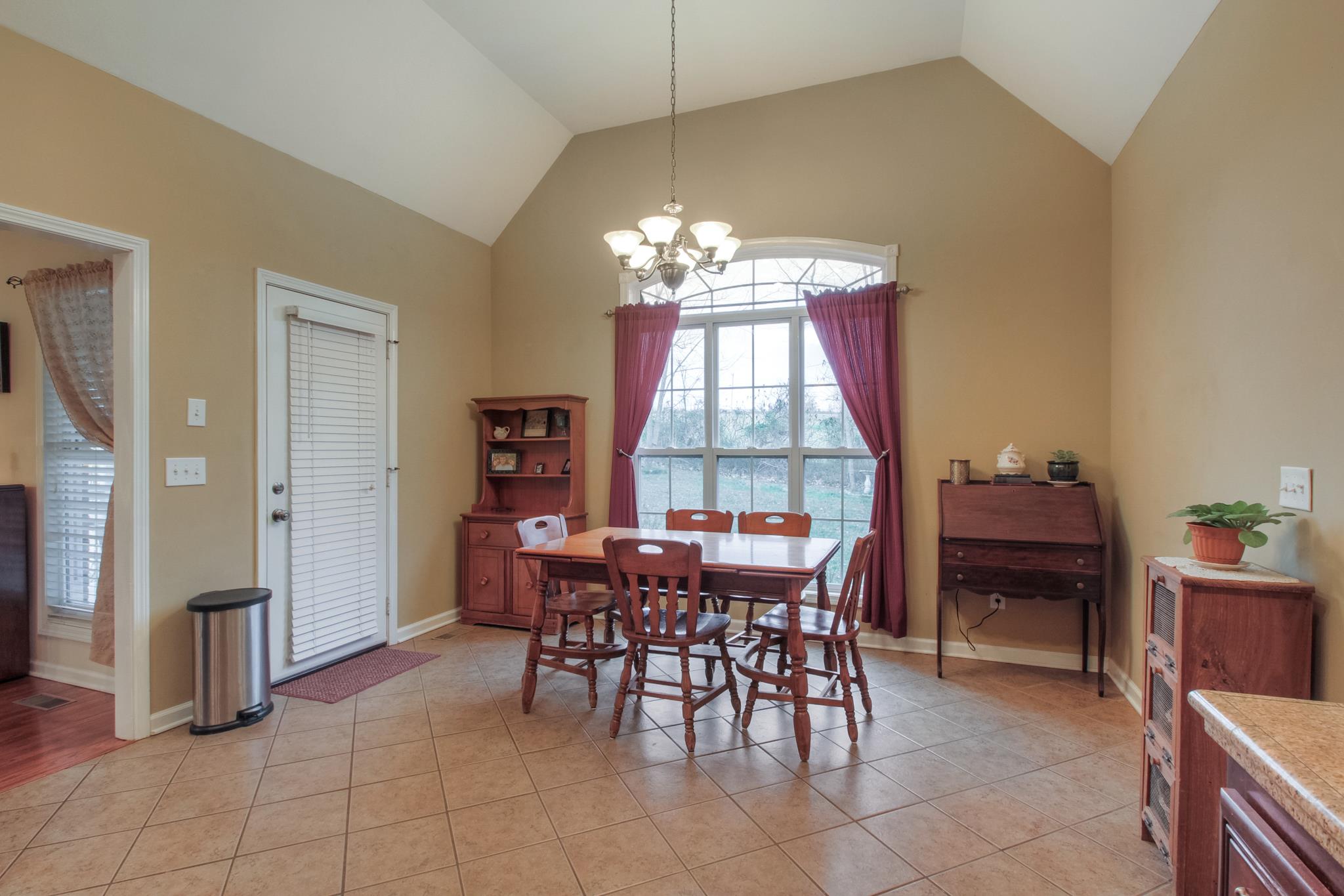 2735 Derby Run Road Springfield, TN 37172 - Photo 6 of 25 a view of a dining room with furniture and window