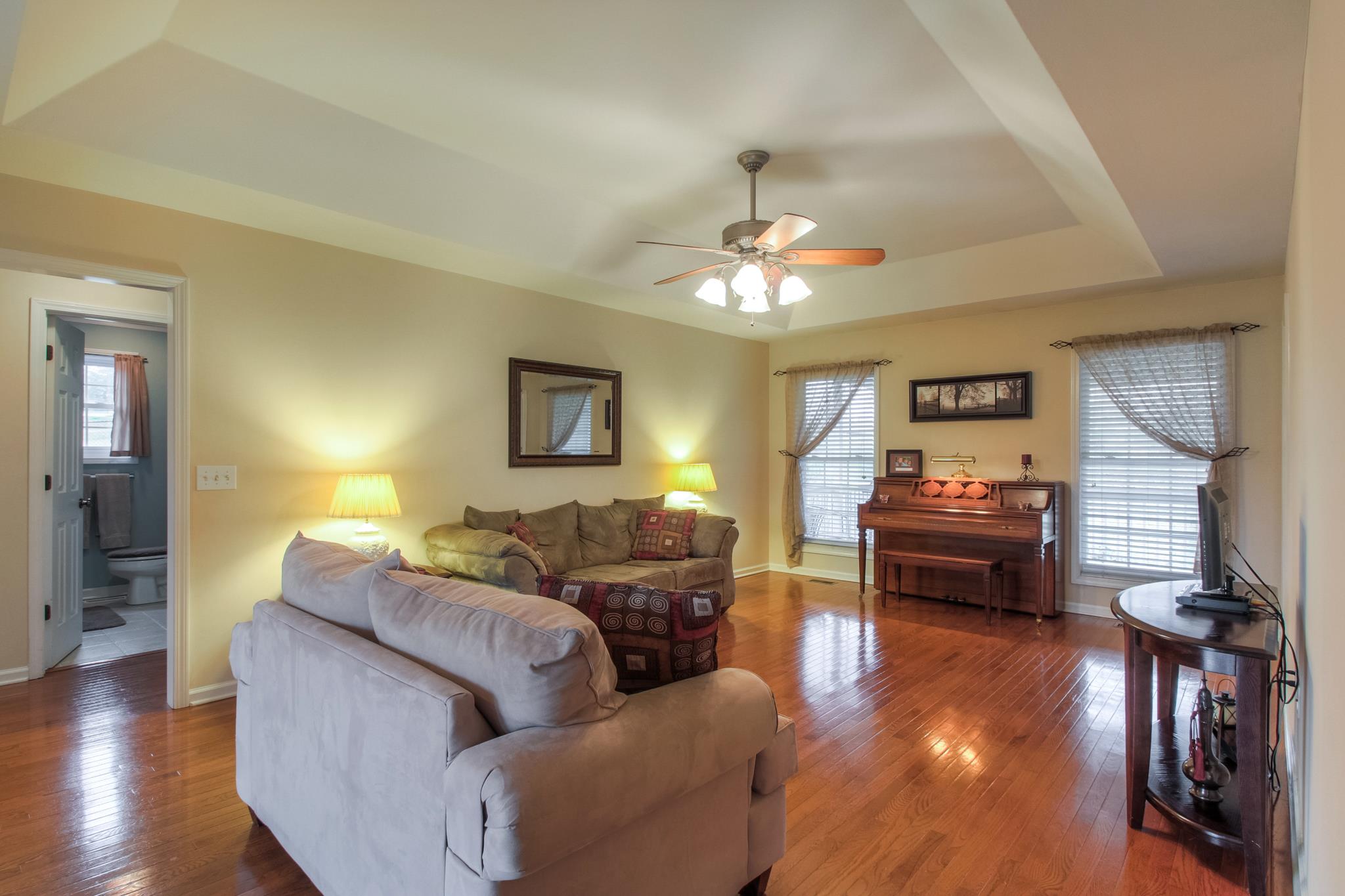 2735 Derby Run Road Springfield, TN 37172 - Photo 7 of 25 a living room with furniture and a chandelier
