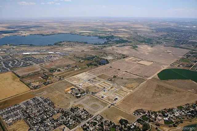 an aerial view of beach and ocean