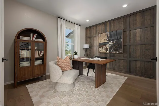 a kitchen with stainless steel appliances granite countertop a stove and a microwave