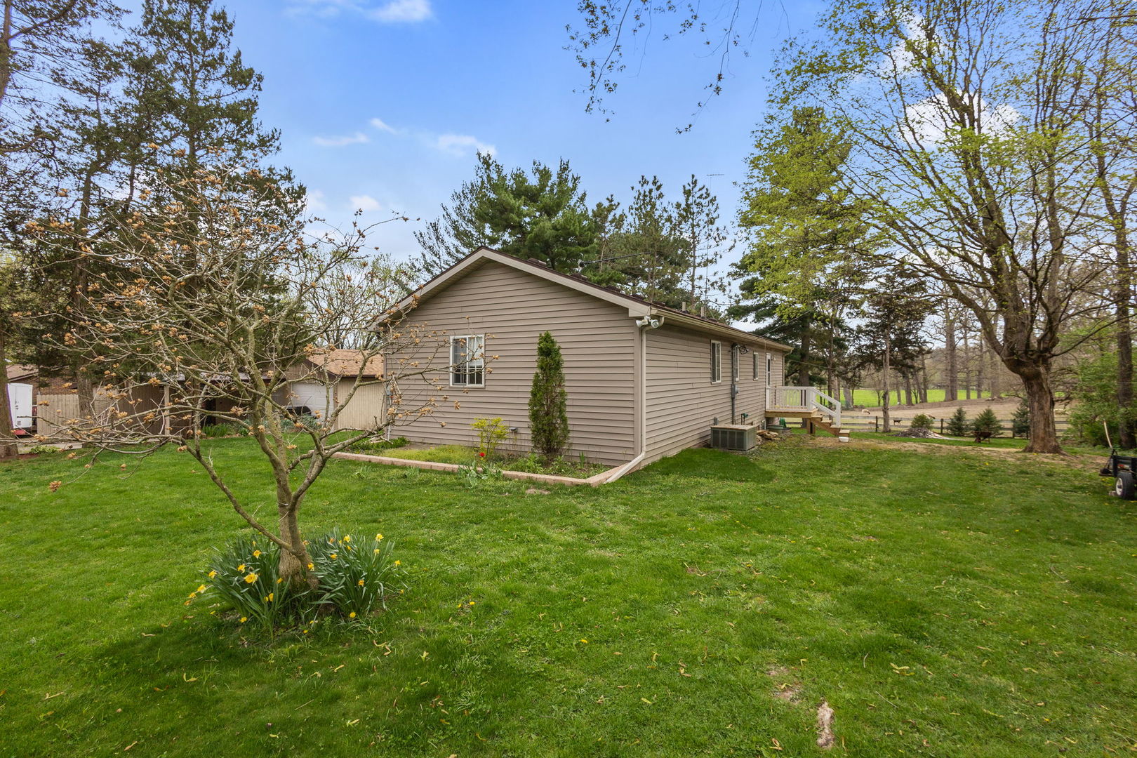 7134 North Bull Creek Road Grant Park, IL 60940 - Photo 12 of 46 a view of backyard of house with green space