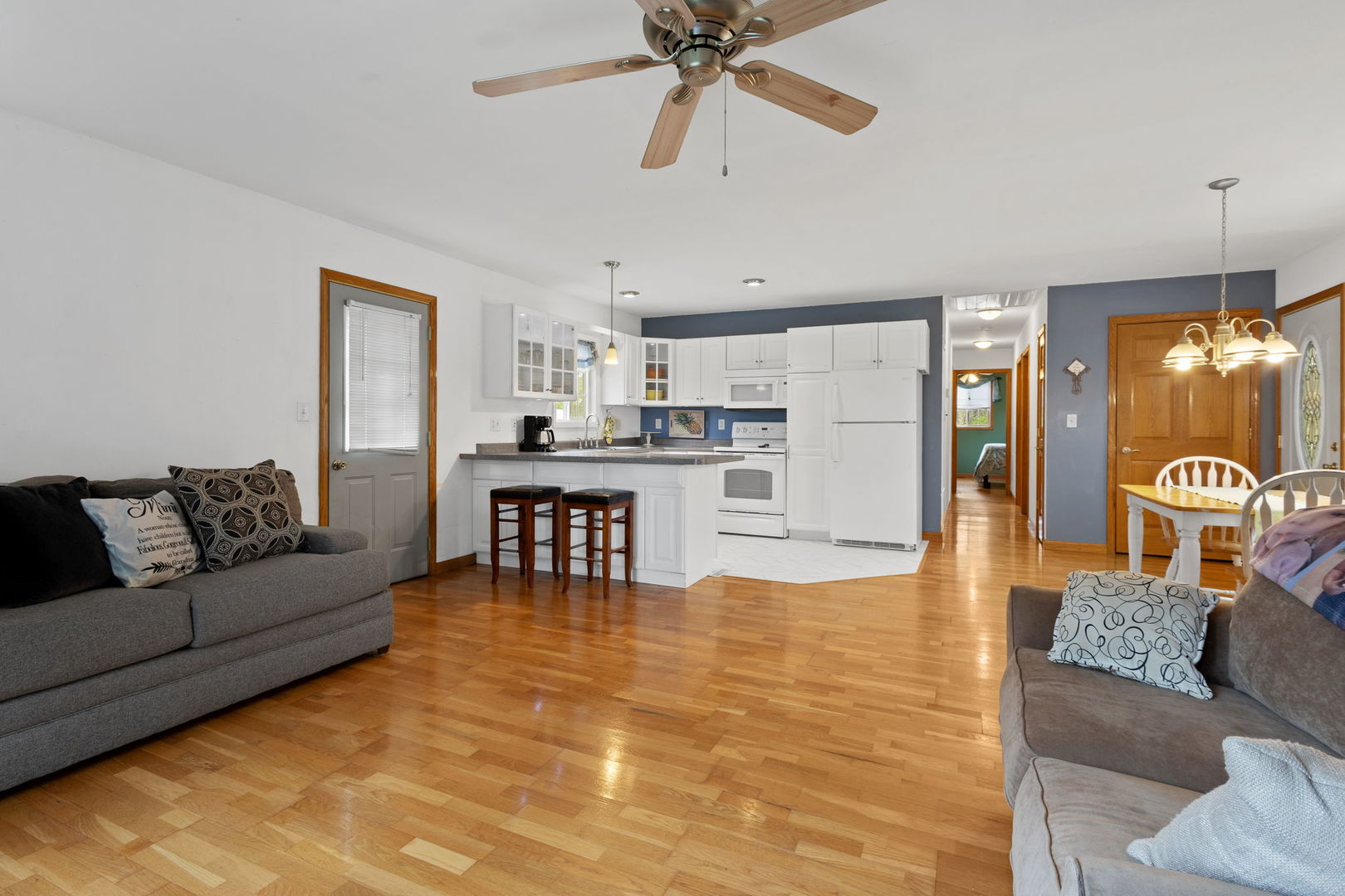 7134 North Bull Creek Road Grant Park, IL 60940 - Photo 24 of 46 a living room with furniture and kitchen view