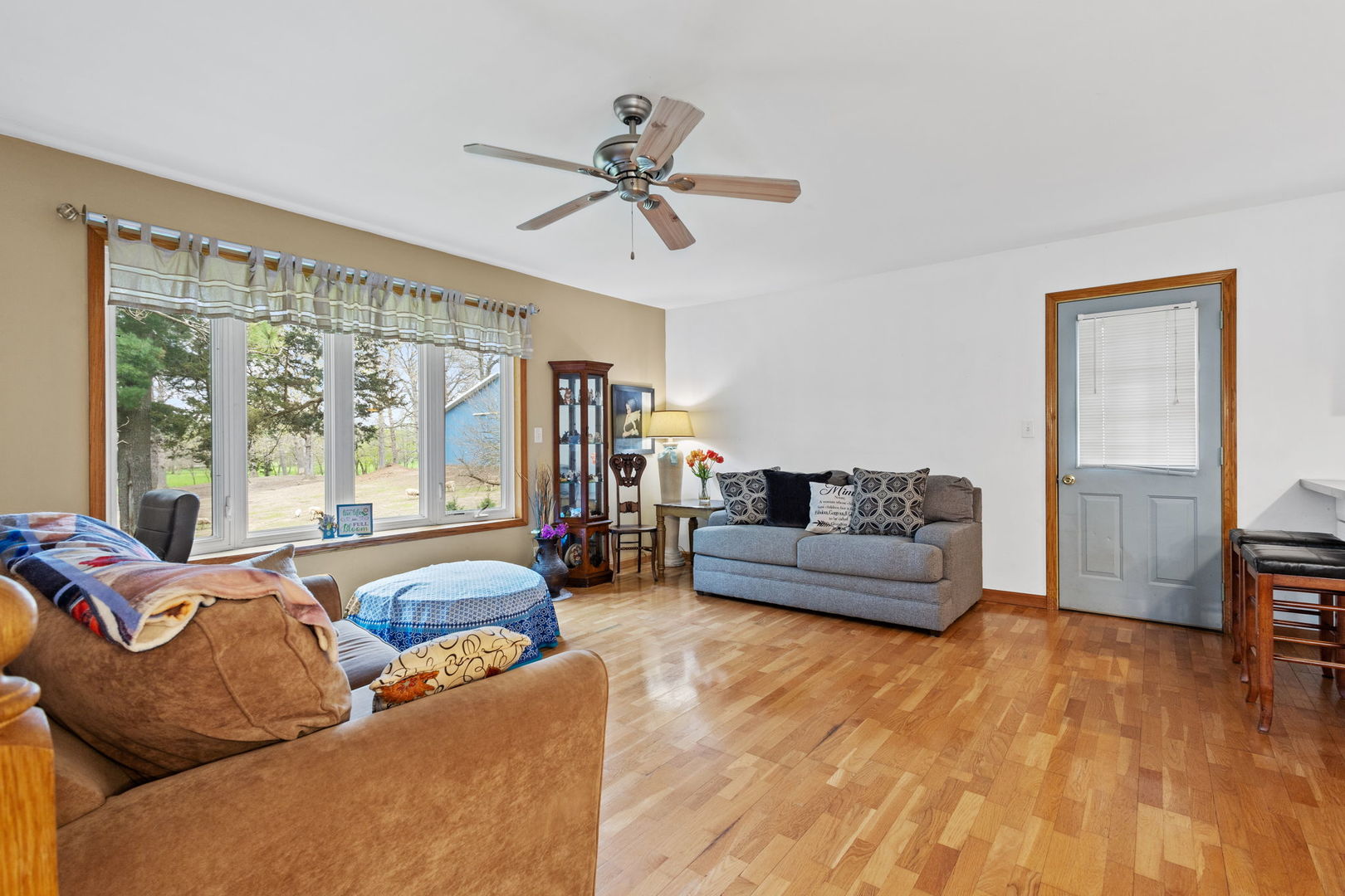 7134 North Bull Creek Road Grant Park, IL 60940 - Photo 26 of 46 a living room with furniture and a large window