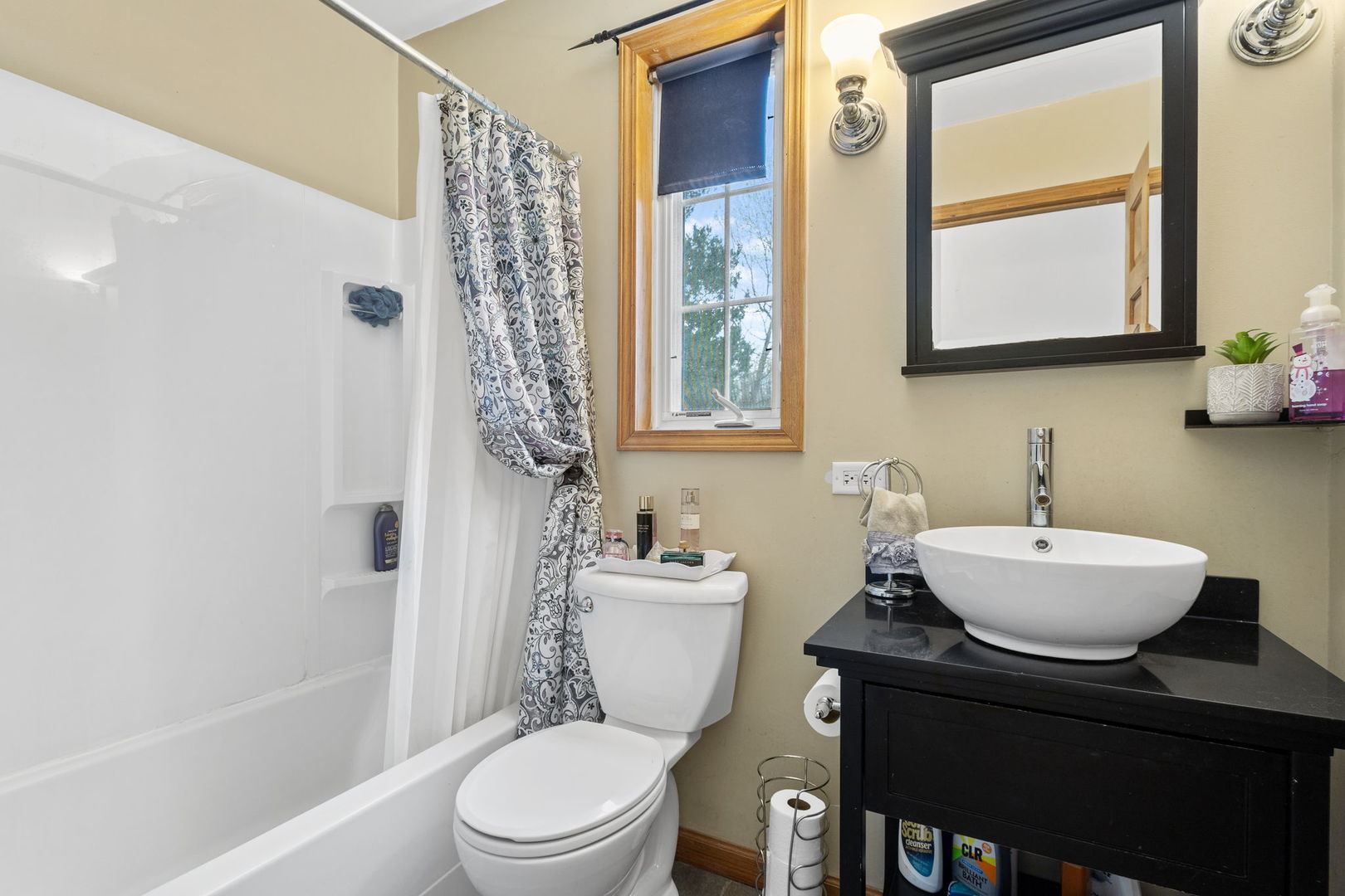 7134 North Bull Creek Road Grant Park, IL 60940 - Photo 36 of 46 a bathroom with a sink a toilet a mirror and shower