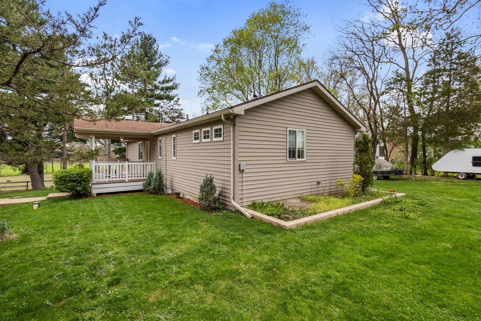 7134 North Bull Creek Road Grant Park, IL 60940 - Photo 10 of 46 a front view of a house with a yard