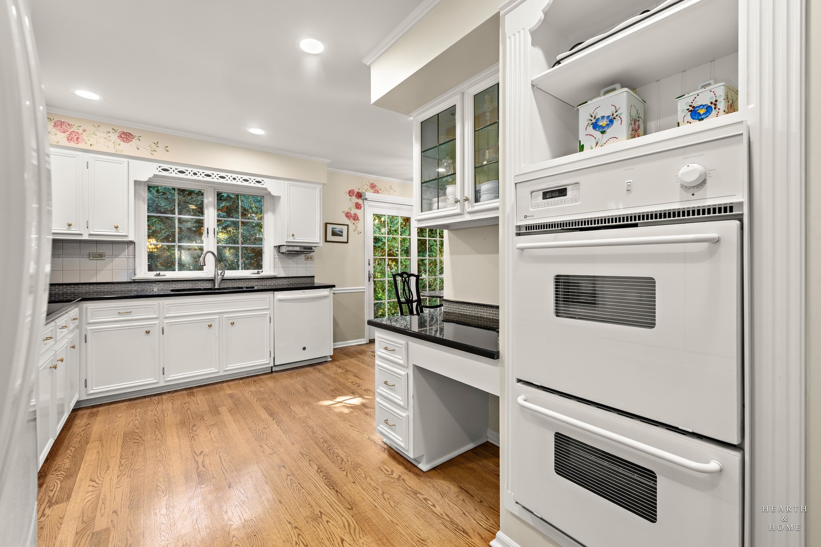 315 Old Mill Road Barrington, IL 60010 - Photo 14 of 37 a kitchen with granite countertop white cabinets and white appliances