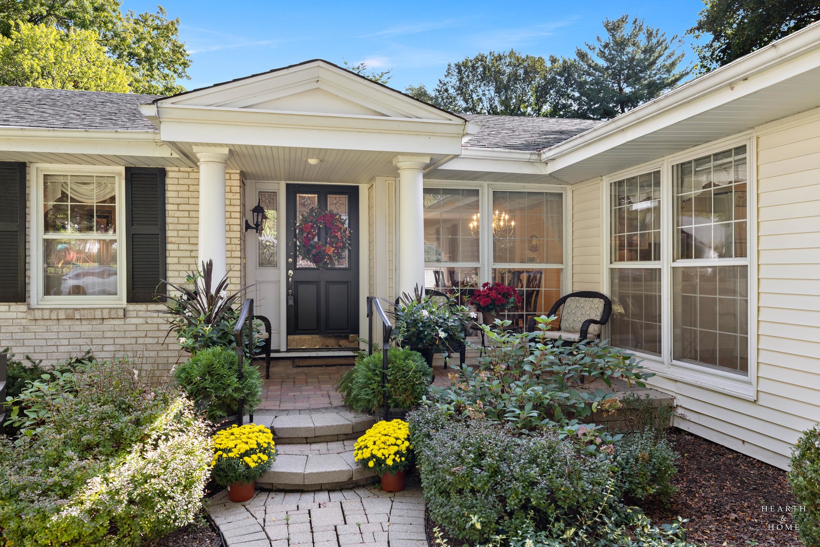315 Old Mill Road Barrington, IL 60010 - Photo 2 of 37 front view of a house with potted plants