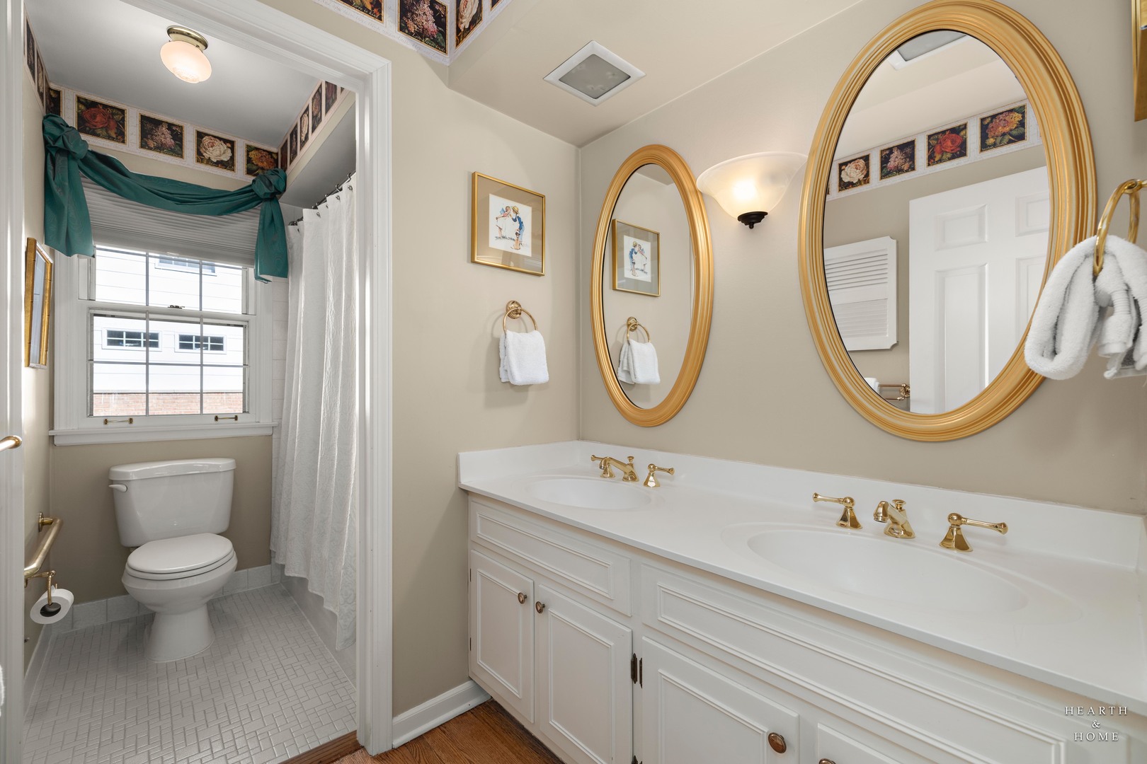 315 Old Mill Road Barrington, IL 60010 - Photo 27 of 37 a bathroom with a toilet a sink and a mirror