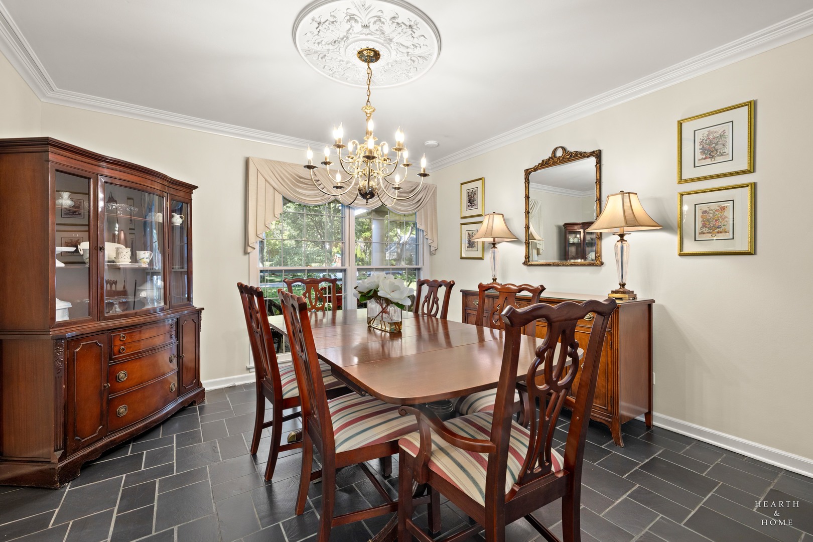 315 Old Mill Road Barrington, IL 60010 - Photo 5 of 37 a view of a dining room with furniture a chandelier and wooden floor