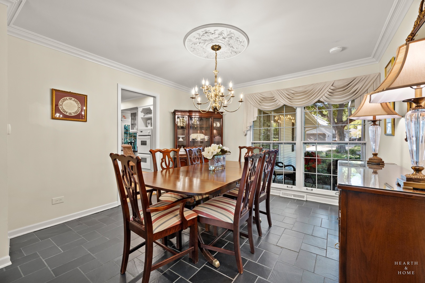 315 Old Mill Road Barrington, IL 60010 - Photo 6 of 37 a view of a dining room with furniture and chandelier