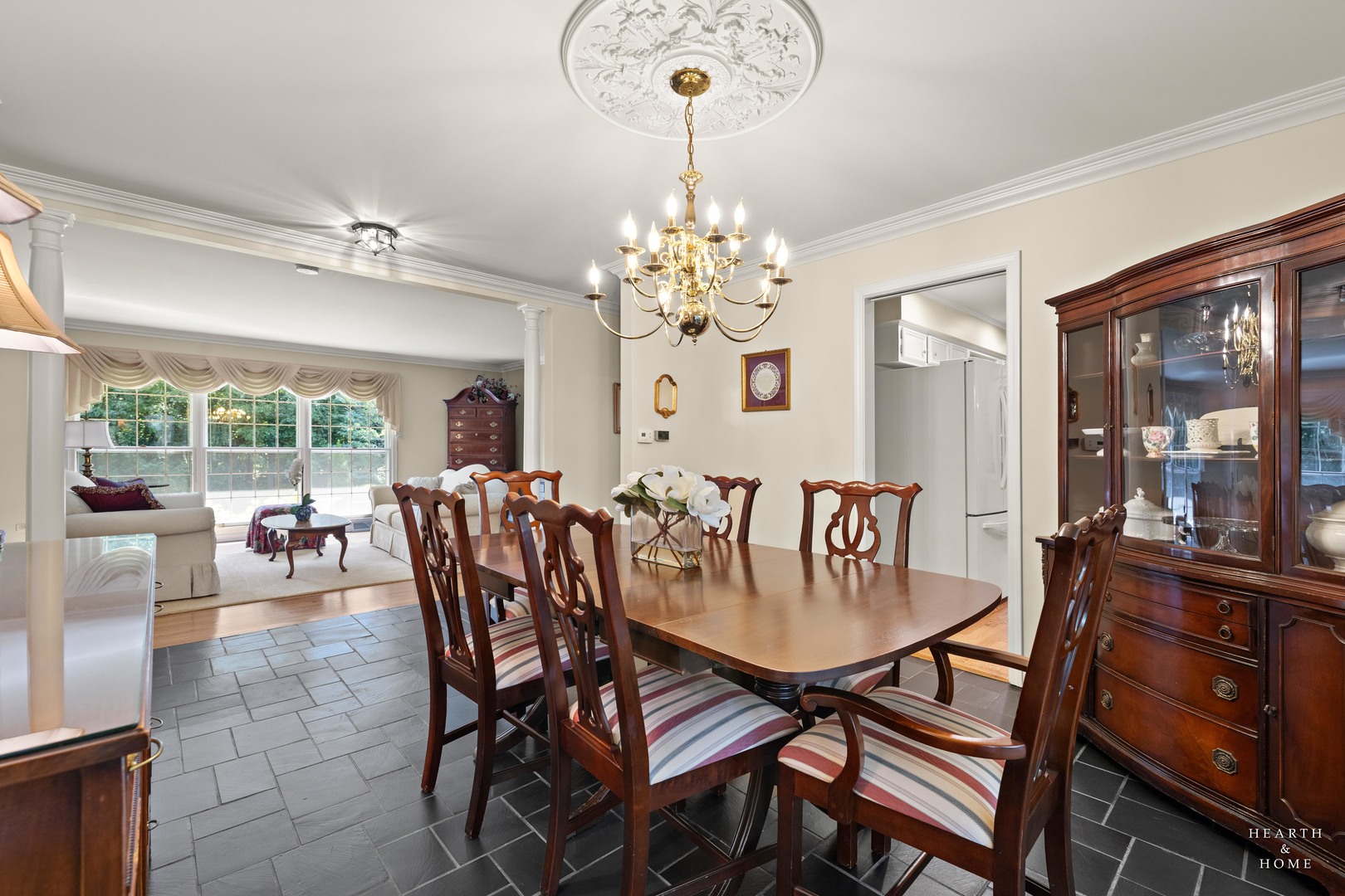 315 Old Mill Road Barrington, IL 60010 - Photo 7 of 37 a dining room with furniture a chandelier and window