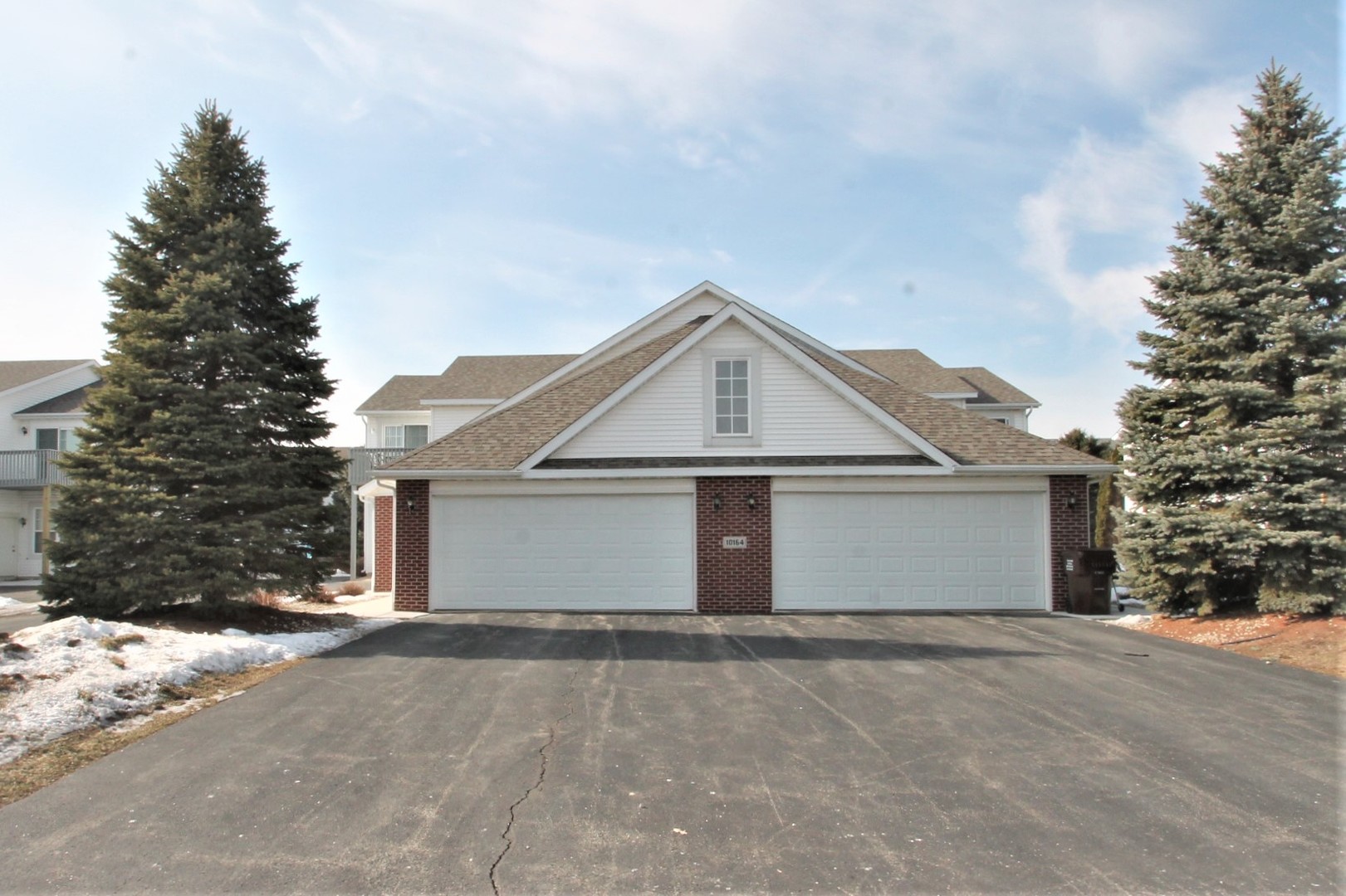 10164 Monarch Road, Unit 125B Roscoe, IL 61073 - Photo 1 of 1 a view of garage and yard