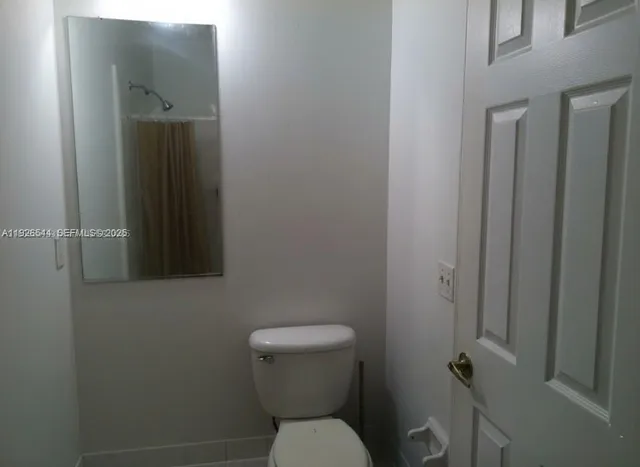 a bathroom with a toilet