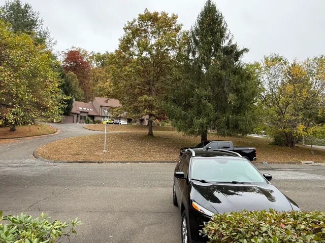 a view of a backyard with sitting area