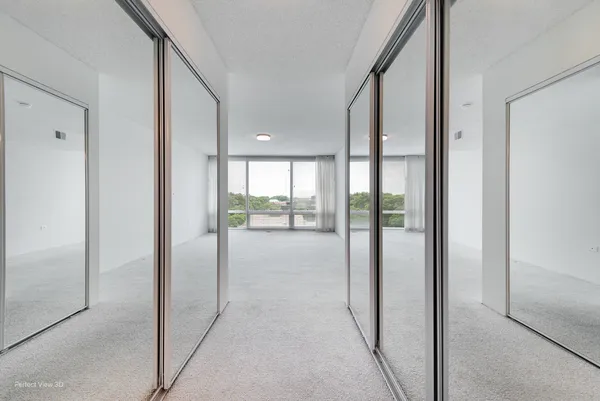 a view of entryway with livingroom